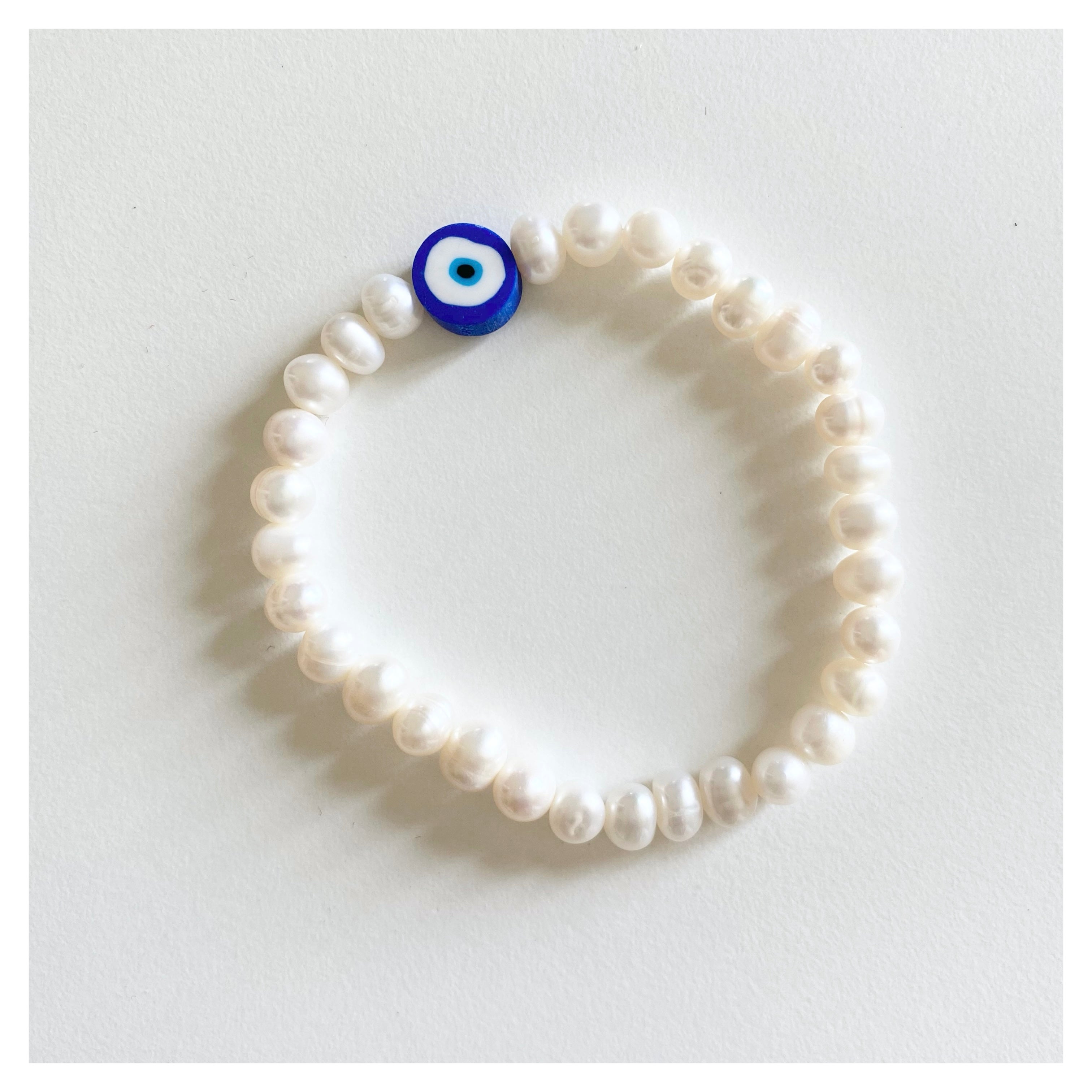 Evil eye clearance pearl bracelet